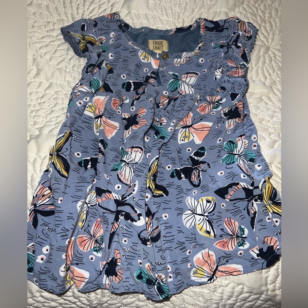 Multicolored butterfly flutter sleeve top